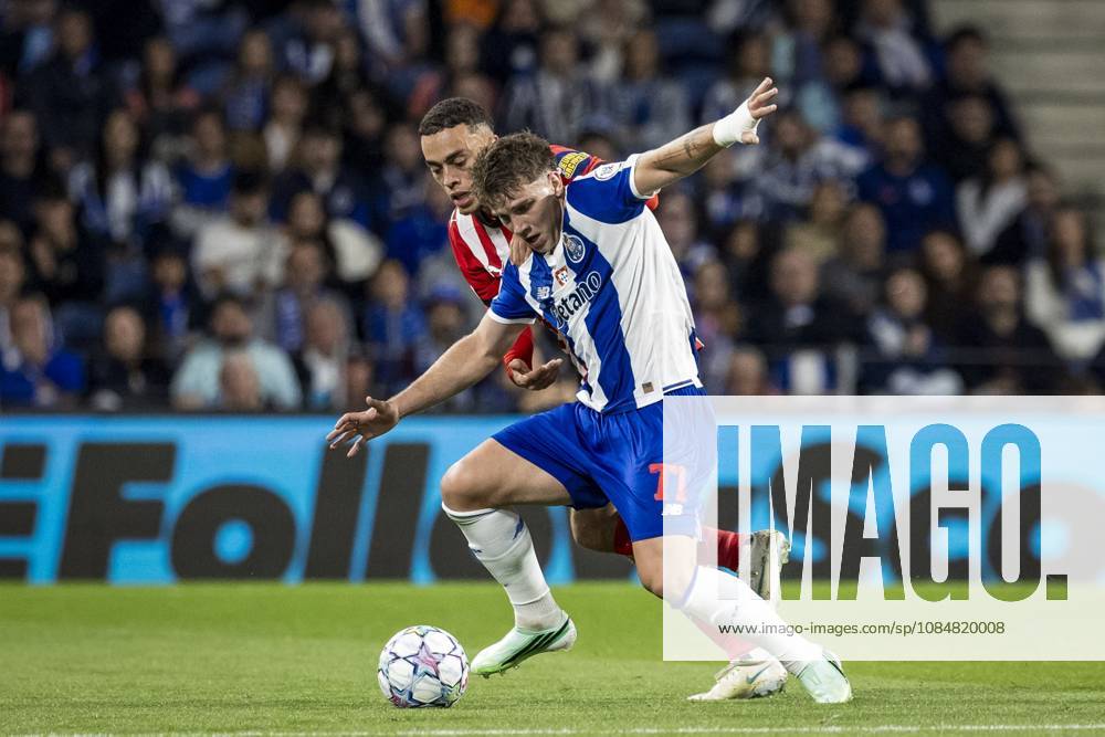 PORTO - (lr) Sergino Dest of PSV Eindhoven and Oskar Pietuszewski of FC Porto during the UEFA Champions League match between FC Porto and PSV Eindhoven at the Estadio Do Dragao, on 20 October 2026 in Porto, Portugal. MORITZ MUELLER ANP ANPxSportx IVx 573093468 originalFilename: 573093468