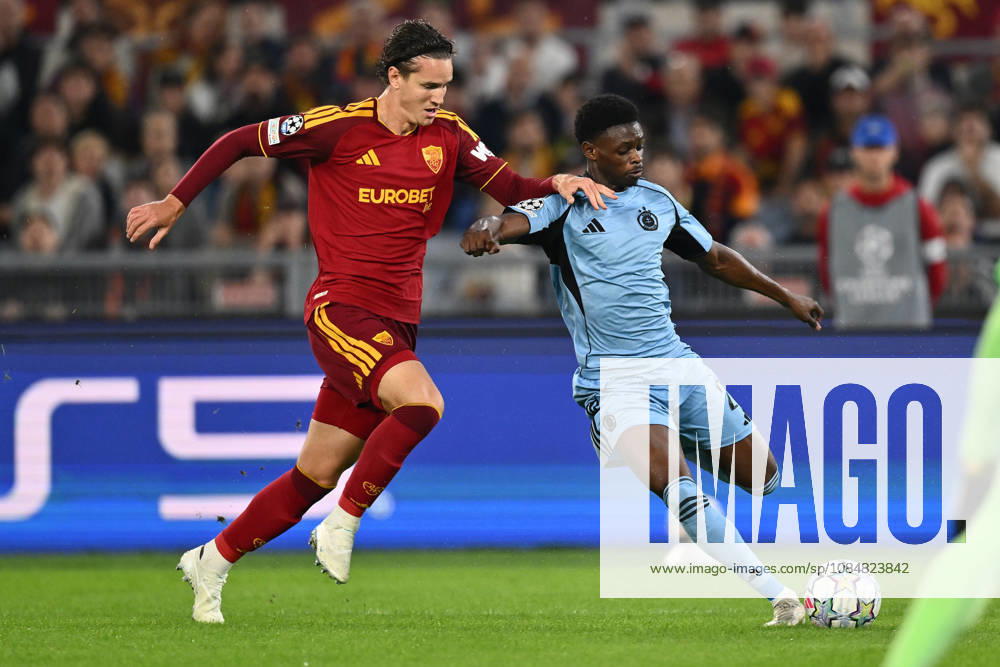 AS Roma v SK Slovan Bratislava - UEFA Champions League 2026 27 League Phase MD3 Daniele Ghilardi of A.S. Roma and Suleiman Camara of S.K. Slovan Bratislava are in action during the UEFA Champions League phase day 3 football match between A.S. Roma and S.K. Slovan Bratislava at the Olympic Stadium in Rome, Italy, on October 20, 2026. Rome Italy Italy