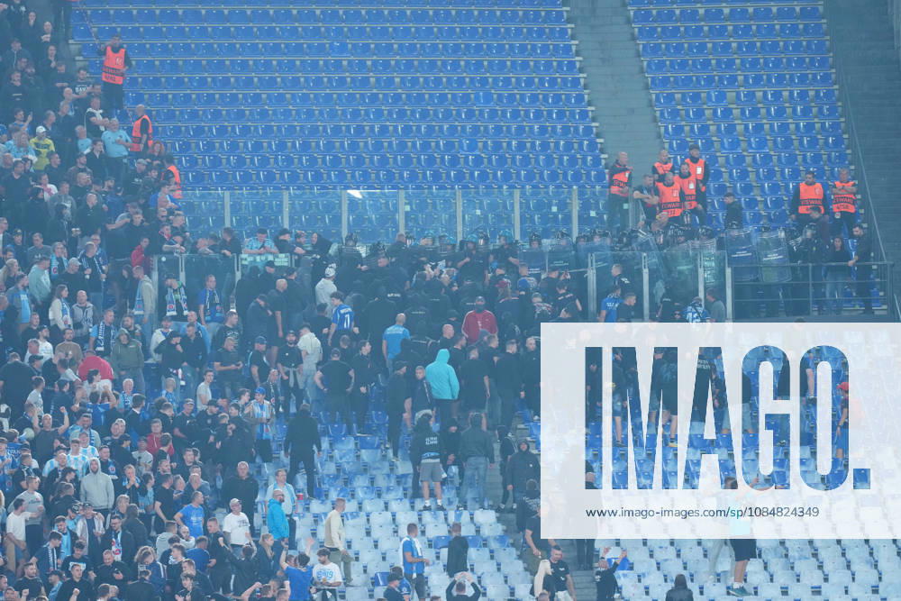 The riot police units from the Polizia and the Carabinieri are attempting to contain the Slovan Bratislava fans. during the UEFA Champions League Phase - Matchday 3 soccer match between AS Roma-Slovan Bratislava at the Rome s Olympic stadium, Italy - Tuesday October 20, 2026 - Soccer ( Photo by Alfredo Falcone LaPresse )