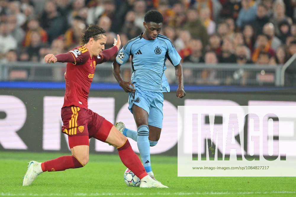 20th October 2026; Stadio Olimpico, Rome, Italy; UEFA Champions League Football, Roma versus Slovan Bratislava; Daniele Ghilardi of Roma under pressure from Suleiman Camara of Slovan Bratislava AllShotLive