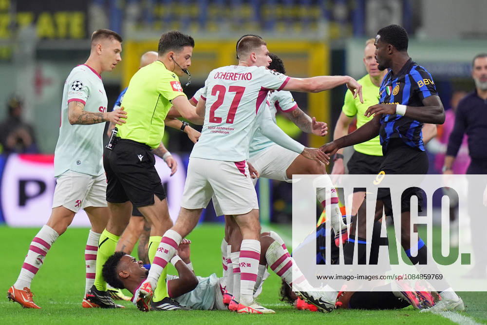 Inter Milan s Marcus Thuram Shakhtar s Oleh Ocheretko during the Uefa Champions League soccer match between Inter and Shakhtar Donetsk at San Siro Stadium in Milan , Italy - Wednesday October 21 , 2026. - Soccer