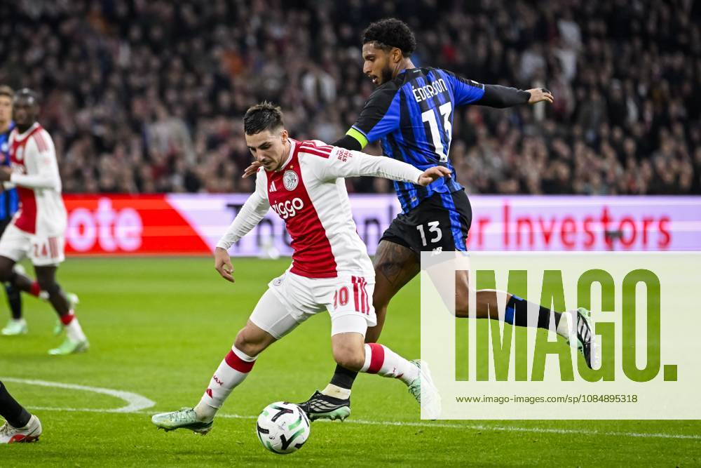 AMSTERDAM - (lr) Oscar Gloukh of Ajax and Ederson of Atalanta BC during the UEFA Conference League match between AFC Ajax and Atalanta BC at the Johan Cruijff ArenA on 22 October 2026 in Amsterdam, the Netherlands. OLAF KRAAK ANP UEFA Conference League 2026 27 ANPxSportx IVx 573298465 originalFilename: 573298465