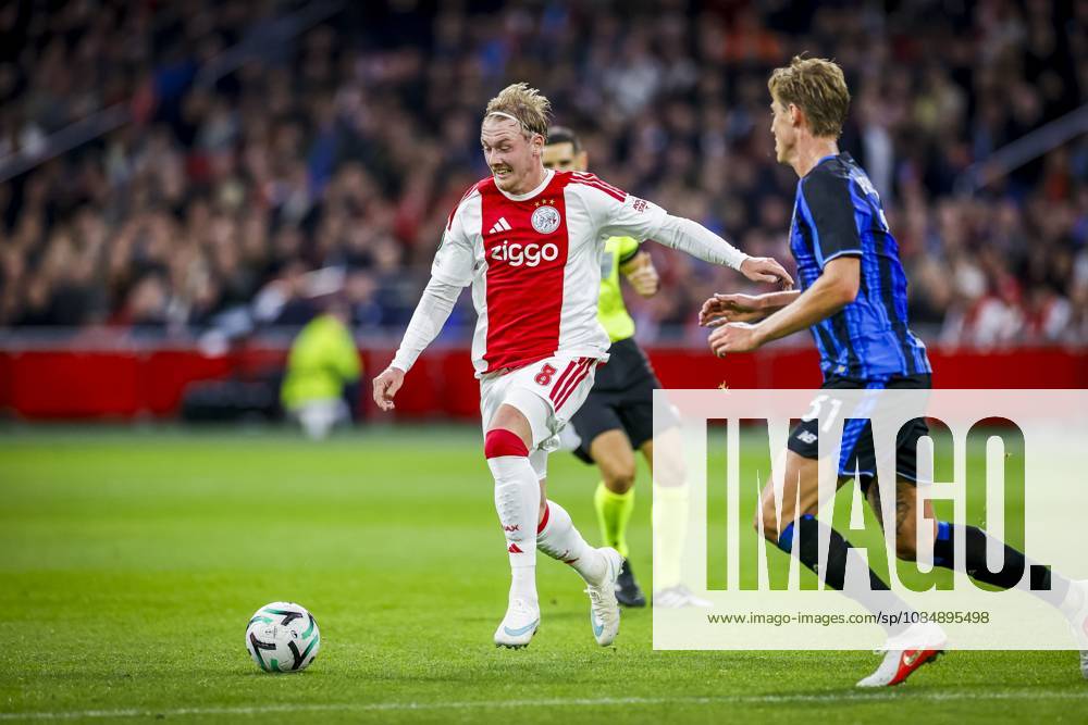 , JohanCruijff ArenA , season 2026 2027 , UEFA Conference League , League phase - Matchday 3 football , match between Ajax and Atalanta , Picture shows Ajax player Julian Brandt and Atalanta player Thomas Kristensen Ajax - Atalanta x208963046x