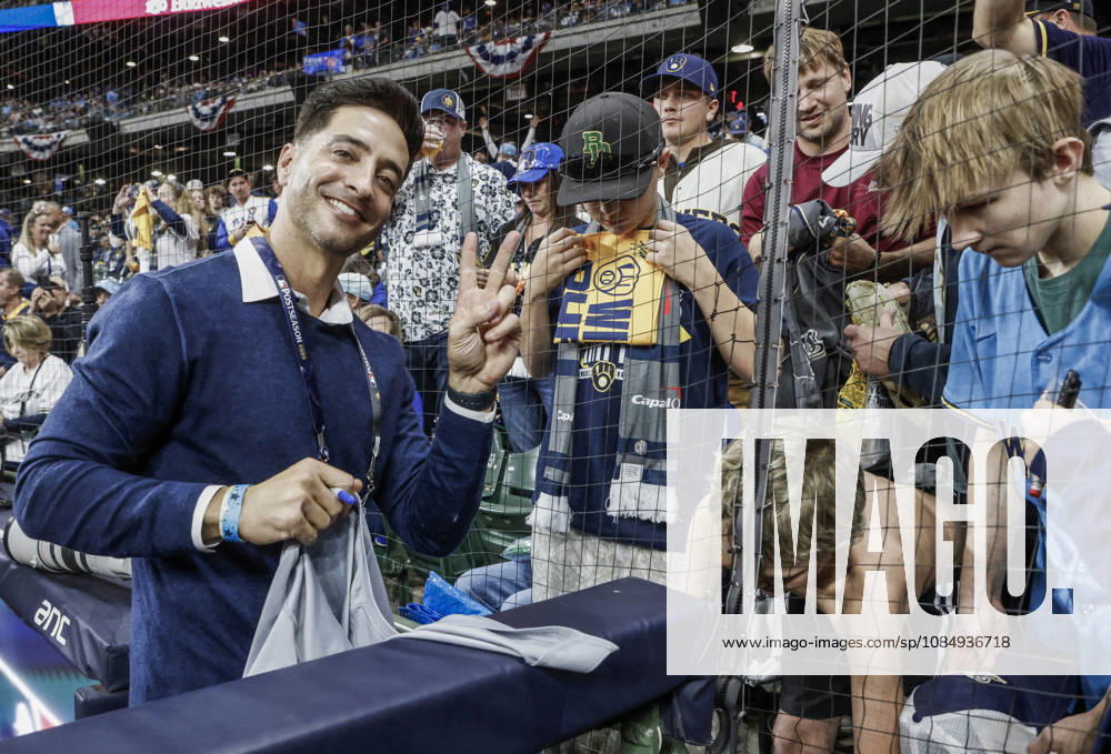 Former Brewers outfielder Ryan Braun poses as he signs autographs for fans before the start of game one of the 2026 World Series between the Tampa Bay Rays and the Milwaukee Brewers at American Family Field in Milwaukee, Wisconsin on Friday, October 23, 2026. MIL20261023812 TANNENxMAURY
