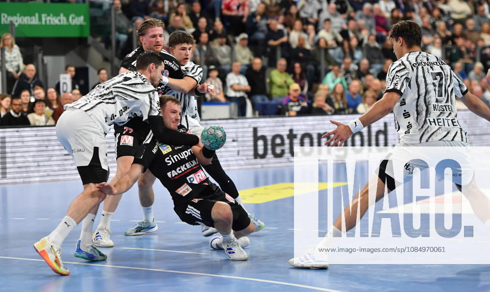2 - Handball - 1. Bundesliga DAIKIN HBL - Saison 2026 2027 - 10. Spieltag: HC Erlangen Metropolregion Nürnberg HCE - THW Kiel - OGo - - Hendrik Pekeler (61, THW Kiel) Frieder Bandlow (2, HC Erlangen HCE )