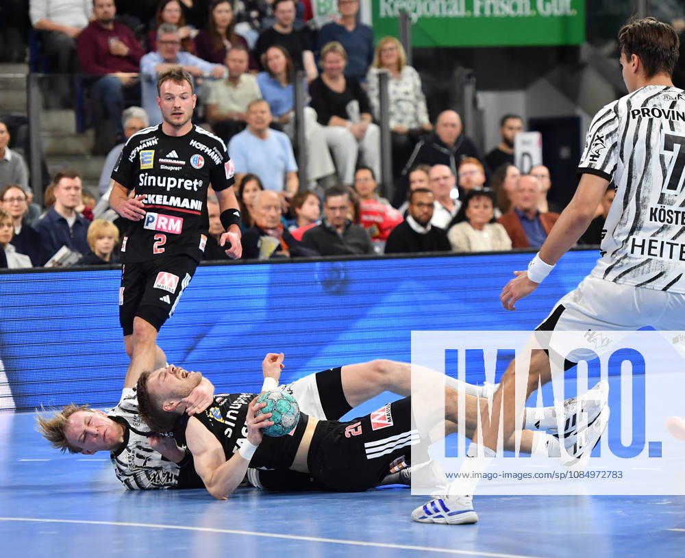 2 - Handball - 1. Bundesliga DAIKIN HBL - Saison 2026 2027 - 10. Spieltag: HC Erlangen Metropolregion Nürnberg HCE - THW Kiel - OGo - - Eric Johansson (21, THW Kiel) Christopher Bissel (21, HC Erlangen HCE )