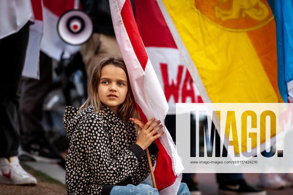 Belarusian opposition leader Sviatlana Tsikhanouskaya attends Ukraine protest A young girl holds a Belarusian flag during a rally at the White House against Russia s war in Ukraine. The Belarusian community in the Washington, DC metro area joined US Ukrainian Activists daily protest at the White House to show their support. Both countries currently suffer at the hands of Russian President Vladimir Putin: Ukraine is under attack, and Belarus is led by Putin puppet Alexander Lukashenko. Washington DC United States