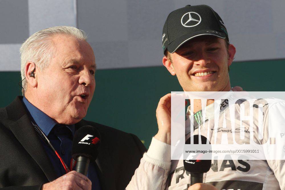 Race, Nico Rosberg (GER) Mercedes AMG F1 W05 race winner with Alan Jones (AUS) Australian Grand Prix, Melbourne 12-16 March 2014