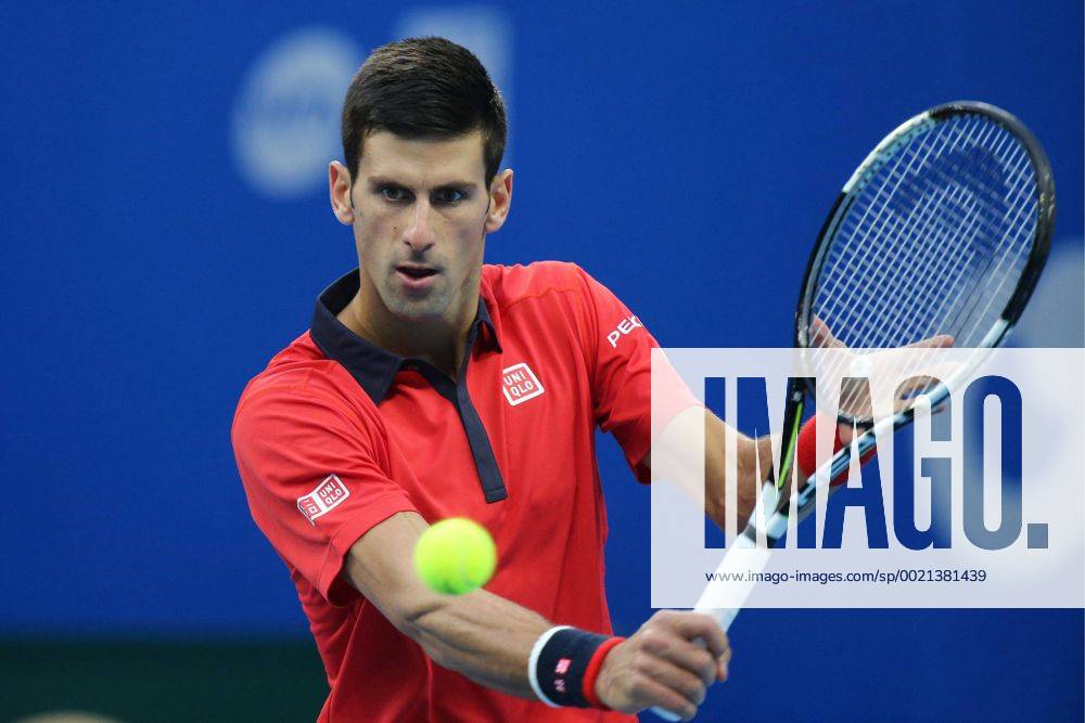 (151008) -- BEIJING, Oct. 8, 2015 -- Novak Djokovic of Serbia hits a return to Zhang Ze of China during their men s singles second round match at the China Open tennis tournament in Beijing, China, Oct. 8, 2015. Djokovic was qualified for the next round after beating Zhang 2-0. ) (SP)CHINA-BEIJING-TENNIS-CHINA OPEN-MEN S SINGLES-DJOKOVIC XingxGuangli
