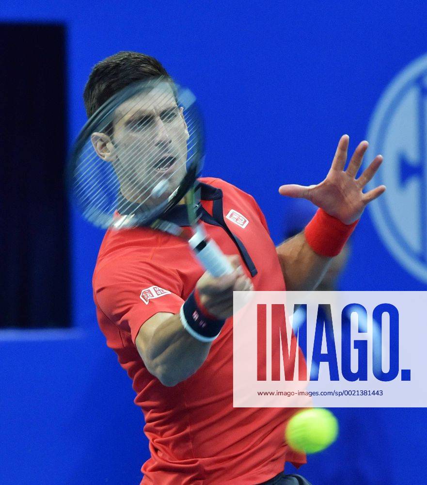 (151008) -- BEIJING, Oct. 8, 2015 -- Novak Djokovic of Serbia hits a return to Zhang Ze of China during their men s singles second round match at the China Open tennis tournament in Beijing, China, Oct. 8, 2015. Djokovic was qualified for the next round after beating Zhang 2-0. ) (SP)CHINA-BEIJING-TENNIS-CHINA OPEN-MEN S SINGLES-DJOKOVIC LixWen