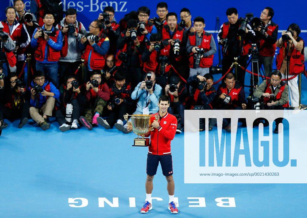 (151011) -- BEIJING, Oct. 11, 2015 -- Novak Djokovic of Serbia poses with his champion trophy during the awarding ceremony for the men s singles final at 2015 China Open Tennis Tournament in Beijing, China, Oct. 11, 2015. Djokovic claimed the title of the event after beating Rafael Nadal of Spain 2-0. ) (SP)CHINA-BEIJING-TENNIS-CHINA OPEN-MEN S SINGLES-FINAL WangxLili