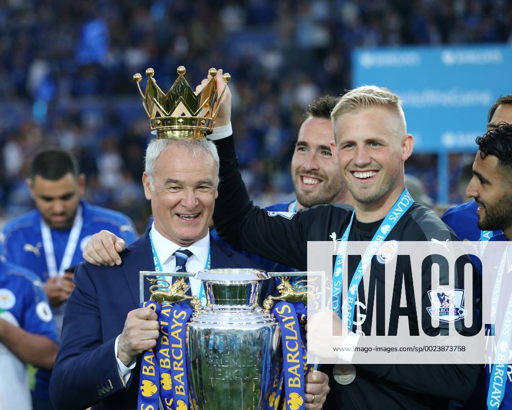 SPORT Leicester s Claudio Ranieri and Kasper Schmeichel celebrate with the trophy during the Barclays Premier League match at the King Power Stadium. Photo credit should read: David Klein Sportimage .