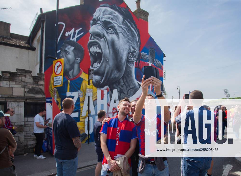Crystal Palace v Nottingham Forest, Premier League, Selhurst Park Stadium, Croydon, UK - 28th May 2023 Crystal Palace fans enjoy the New mural of Wilfried Zaha of Crystal Palace. - Crystal Palace v Nottingham Forest, Premier League, Selhurst Park Stadium, Croydon, UK - 28th May 2023. Croydon Selhurst Park Stadium UK