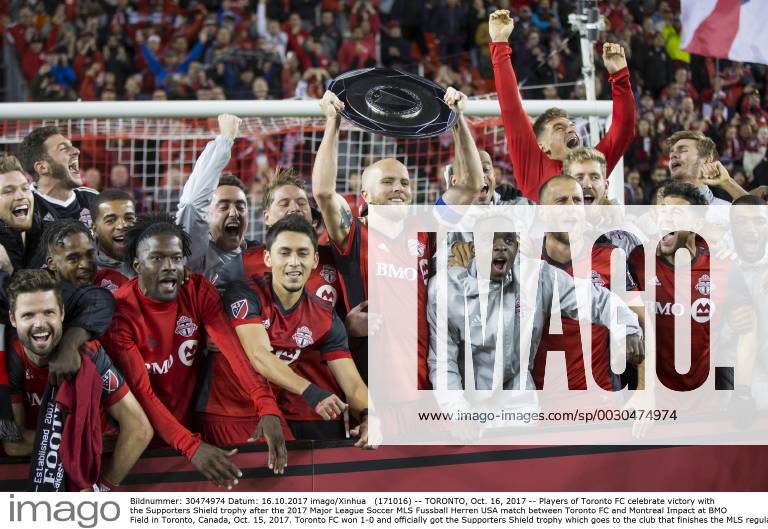 (171016) -- TORONTO, Oct. 16, 2017 -- Players of Toronto FC celebrate victory with the Supporters Shield trophy after the 2017 Major League Soccer MLS Fussball Herren USA match between Toronto FC and Montreal Impact at BMO Field in Toronto, Canada, Oct. 15, 2017. Toronto FC won 1-0 and officially got the Supporters Shield trophy which goes to the club that finishes the MLS regular season in first place. ) (SP)CANADA-TORONTO-SOCCER-MLS-TORONTO FC VS MONTREAL IMPACT ZouxZheng