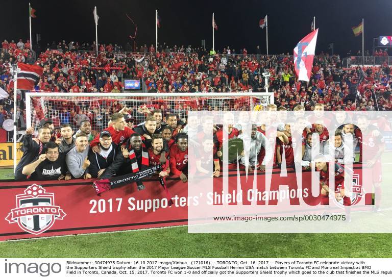 (171016) -- TORONTO, Oct. 16, 2017 -- Players of Toronto FC celebrate victory with the Supporters Shield trophy after the 2017 Major League Soccer MLS Fussball Herren USA match between Toronto FC and Montreal Impact at BMO Field in Toronto, Canada, Oct. 15, 2017. Toronto FC won 1-0 and officially got the Supporters Shield trophy which goes to the club that finishes the MLS regular season in first place. ) (SP)CANADA-TORONTO-SOCCER-MLS-TORONTO FC VS MONTREAL IMPACT ZouxZheng