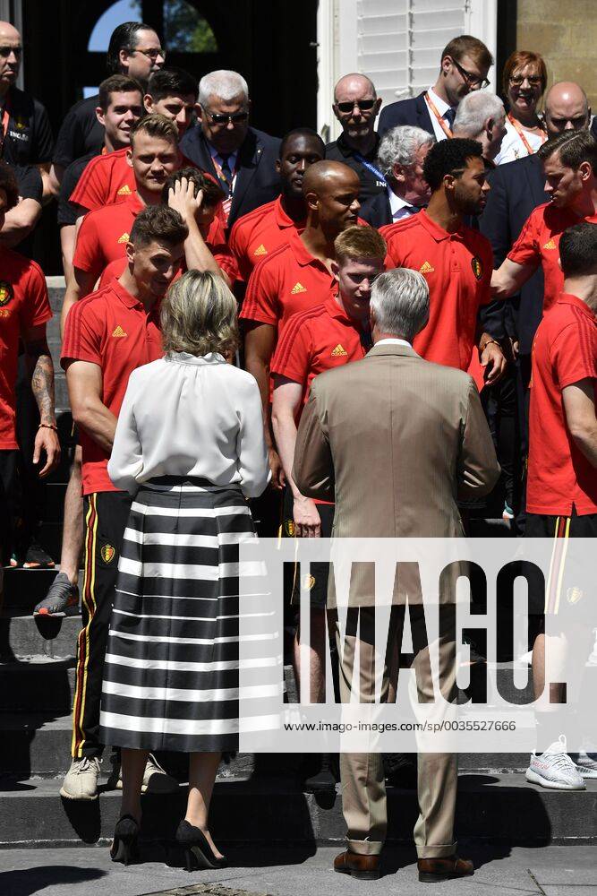 Queen Mathilde of Belgium, King Philippe - Filip of Belgium talk with, Belgium s Thomas Meunier and Belgium s Kevin De Bruyne at the Royal castle in Laken - Laeken, as Belgian national soccer team Red Devils are received by Royal couple after the presence in the semi-final of the soccer World cup in Russia, Sunday 15 July 2018. ERICxLALMAND x05386497x