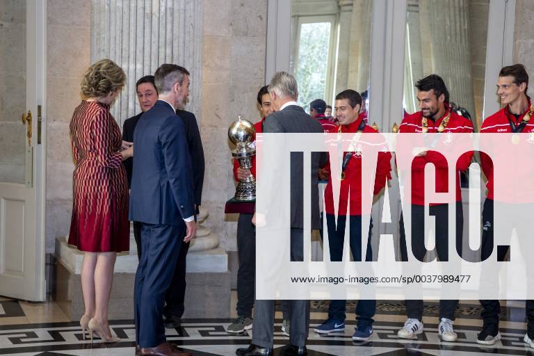 Queen Mathilde of Belgium, King Philippe - Filip of Belgium greet Belgian Hockey Federation chairman Marc Coudron, Belgian Hockey Federation Secretary-General Serge Pilet, Belgium s captain Thomas Briels, holding the World Cup trophy, Belgium s John-John Dohmen, Belgium s Simon Gougnard and Belgium s Felix Denayer pictured during a reception to honour the new hockey world champions, the Belgian Red Lions team, in the Royal castle in Laken - Laeken, Tuesday 18 December 2018. Red Lions won 3-2 the final against The Netherlands in India last last Sunday. HATIMxKAGHAT x05493031x