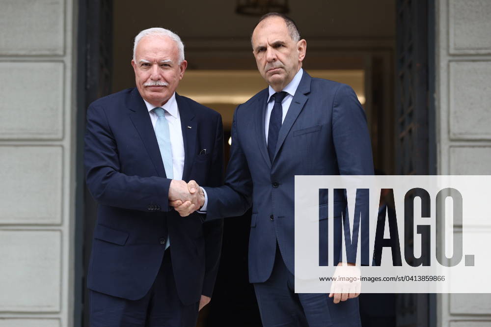 Greek Foreign Minister Giorgos Gerapetritis (R) welcomes the Palestinian Authoritys Foreign Minister Riyad al-Maliki (L) during their meeting in Athens, Greece, 15 February 2024. The Palestinian Authoritys foreign minister is in Athens on a working visit. IMAGO ONE INCH PRODUCTIONS ATHENS Greece