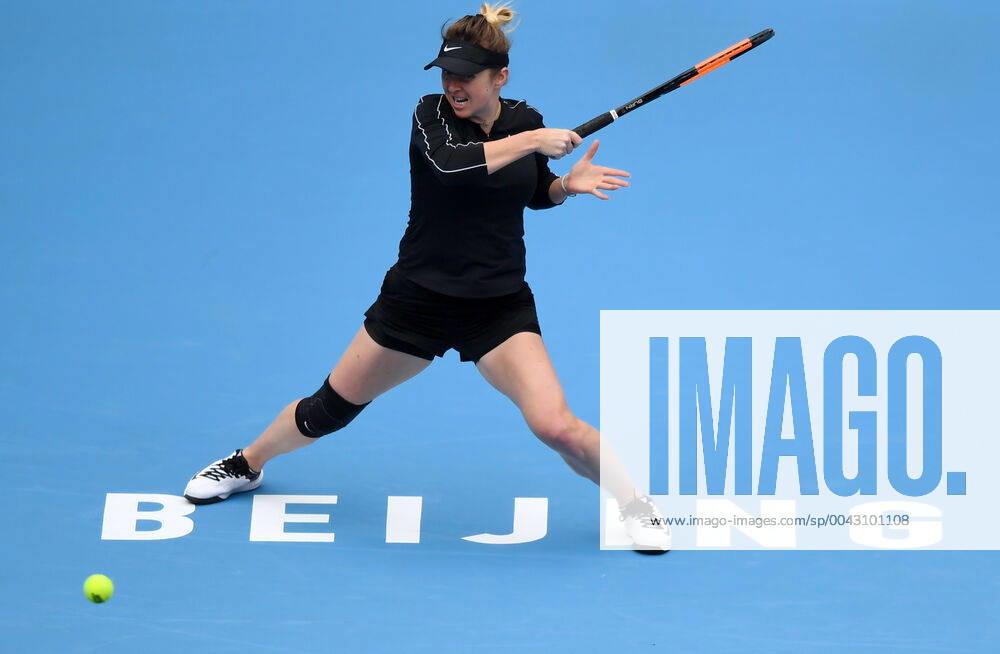 (191004) -- BEIJING, Oct. 4, 2019 -- Elina Svitolina of Ukraine hits a return during the women s singles quarterfinal match against Kiki Bertens of the Netherlands at 2019 China Open tennis tournament in Beijing, capital of China, Oct. 4, 2019. ) (SP)CHINA-BEIJING-TENNIS-CHINA OPEN-WOMEN S SINGLES(CN) LixYibo