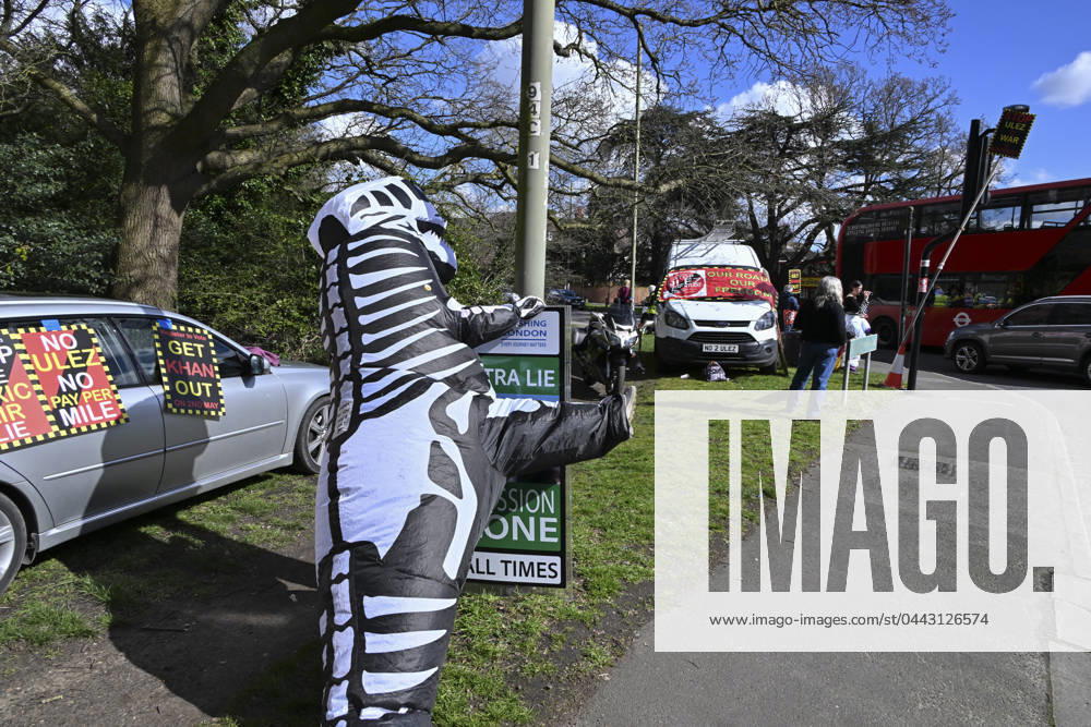 Protesters during a protest against the Ultra Low Emission Zone at the Chislehurst War Memorial in Chislehurst, London. ULEZ cameras in Chislehurst and other nearby areas have been vandalised in previous months.