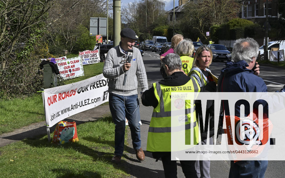 Protesters during a protest against the Ultra Low Emission Zone at the Chislehurst War Memorial in Chislehurst, London. ULEZ cameras in Chislehurst and other nearby areas have been vandalised in previous months.