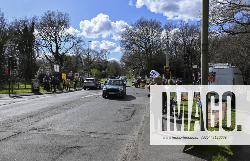 Protesters during a protest against the Ultra Low Emission Zone at the Chislehurst War Memorial in Chislehurst, London. ULEZ cameras in Chislehurst and other nearby areas have been vandalised in previous months.
