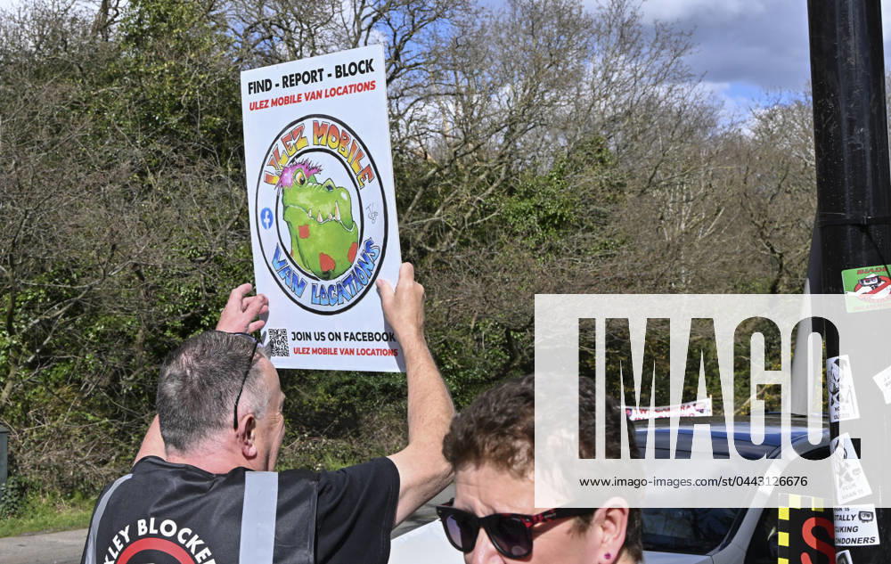 Protesters during a protest against the Ultra Low Emission Zone at the Chislehurst War Memorial in Chislehurst, London. ULEZ cameras in Chislehurst and other nearby areas have been vandalised in previous months.