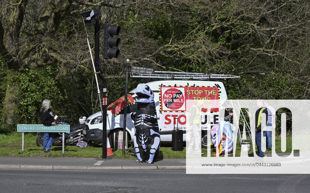 Protesters during a protest against the Ultra Low Emission Zone at the Chislehurst War Memorial in Chislehurst, London. ULEZ cameras in Chislehurst and other nearby areas have been vandalised in previous months.