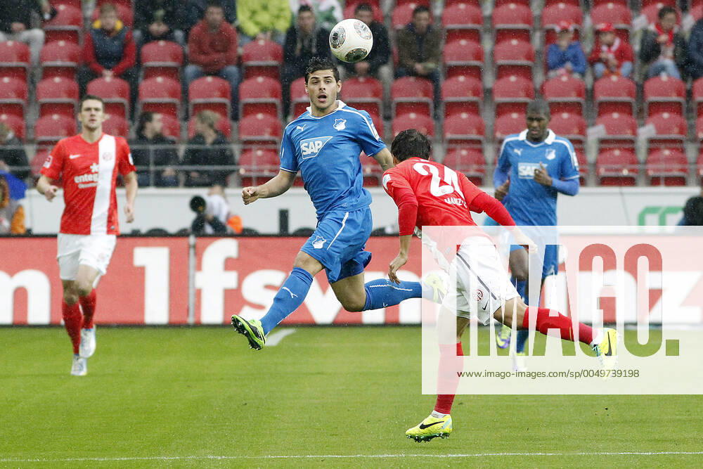 Mainz, Deutschland 05. Oktober 2013: 1. Bundesliga - 13 14 - 8. Spieltag - 1. FSV Mainz 05 vs. 1899 Hoffenheim. v.li. Kevin Volland (Hoffenheim) im Kopfballduell gegen Joo-Ho Park (Mainz), Kopfball Kopfballduell, quer, querformat 1. Bundesliga - 13 14 - 8. Spieltag - 1. FSV Mainz 05 vs. 1899 Hoffenheim.