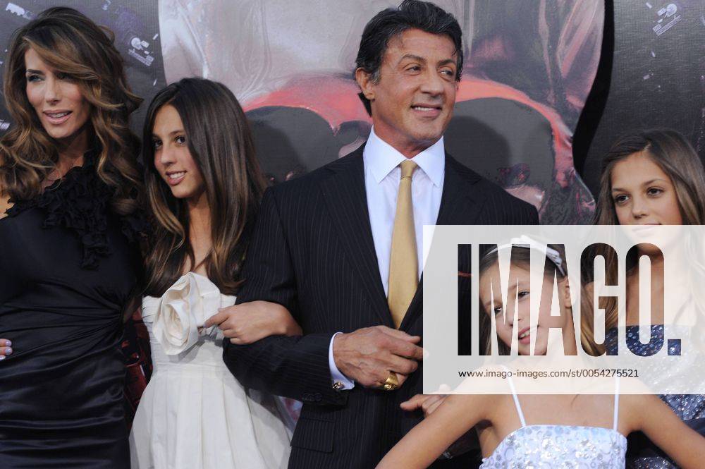 Cast member Sylvester Stallone attends the premiere of the motion picture thriller The Expendables with his wife Jennifer Flavin (L) and their daughters Sophia Rose (2nd-L), Scarlet Rose (4th-L) and Sistine Rose (R) at Grauman s Chinese Theatre in the Hollywood section of Los Angeles on August 3, 2010. LAP2010080368