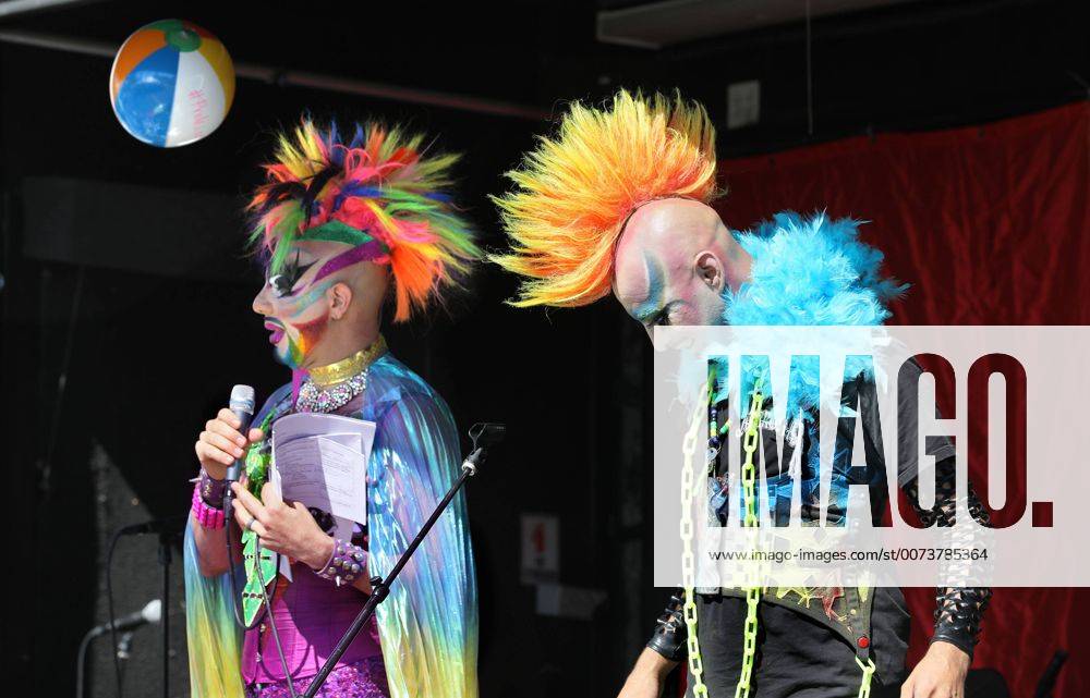 Oceanside, California, USA - 10 8 2016 Oceanside, CA_ GLAM GLITZ, at left, and EARTH INTRUDER, at right, perform as MC s of the annual North County Pride at the Beach festival in Oceanside, California. The event was sponsored by the North County LGBTQ Resource Center. Photo by Oceanside USA - ZUMAn47_