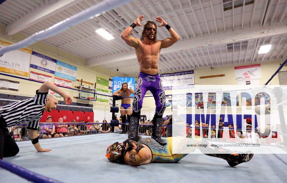 Oceanside, California, USA - 10 15 2016_Oceanside, CA_SoCal Pro Wrestling s Rumble in Oceanside event at the Oceanside Boys & Girls Club gymnasium. Wrestler Ricky Mandel stands on opponent Motros Jungle._Photo by Oceanside USA - ZUMAn47_