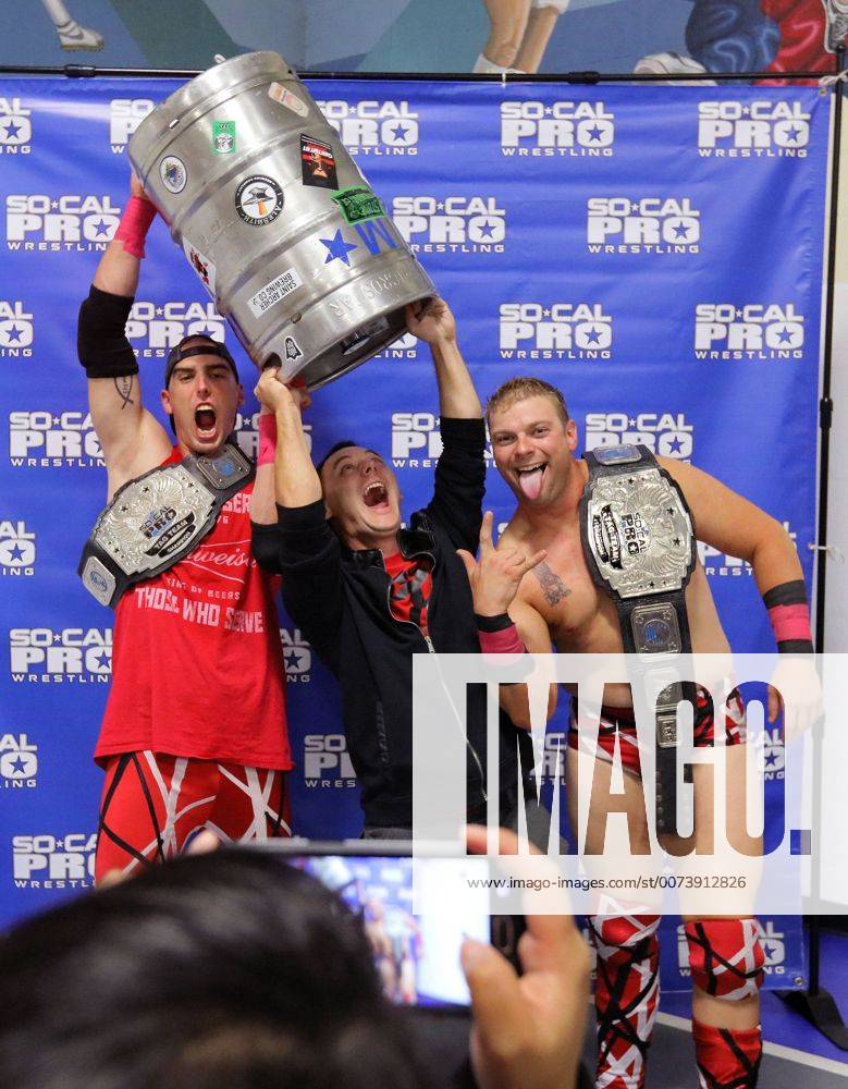 Oceanside, California, USA - 10 15 2016_Oceanside, CA_SoCal Pro Wrestling s Rumble in Oceanside event at the Oceanside Boys & Girls Club gymnasium. At intermission fan Richard Babiarz, middle, has his photo taken with champion tag-team PBR, that stands for Partying, Brawlin and Rasslin ._Photo by Oceanside USA - ZUMAn47_