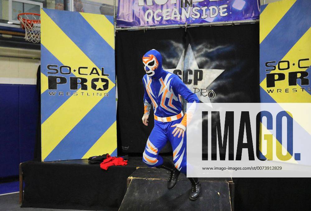 Oceanside, California, USA - 10 15 2016_Oceanside, CA_SoCal Pro Wrestling s Rumble in Oceanside event at the Oceanside Boys & Girls Club gymnasium. A wrestler in an elaborate costume enters the gym for a match._Photo by Oceanside USA - ZUMAn47_