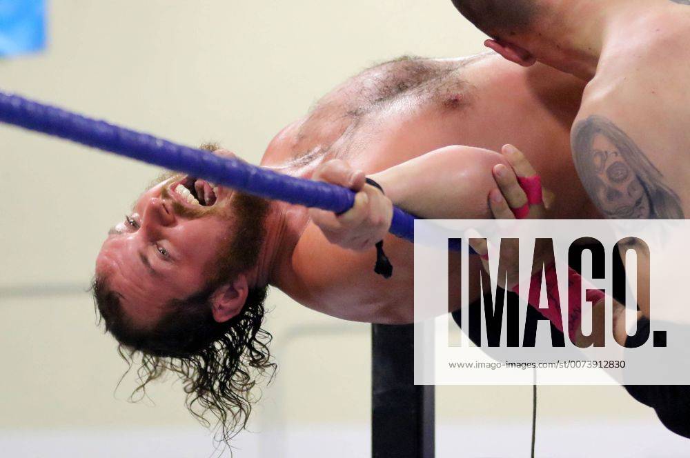 Oceanside, California, USA - 10 15 2016_Oceanside, CA_SoCal Pro Wrestling s Rumble in Oceanside event at the Oceanside Boys & Girls Club gymnasium. Wrestler Dirty Doug tries to keep from being pushed out of the ring._Photo by Oceanside USA - ZUMAn47_