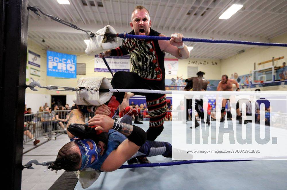 Oceanside, California, USA - 10 15 2016_Oceanside, CA_SoCal Pro Wrestling s Rumble in Oceanside event at the Oceanside Boys & Girls Club gymnasium. Wrestler Destro smashes the face of opponent SoCal Crazy._Photo by Oceanside USA - ZUMAn47_