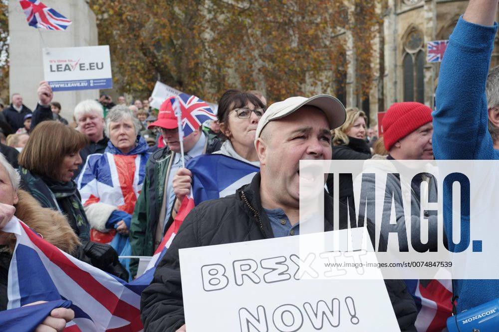 London, England, United Kingdom - A pro-Brexit demonstrator chants during a protest outside the Houses of Parliament on November 23, 2016 in London, England. British Prime Minister Theresa May has said that she will not delay triggering article 50, the formal process of leaving the European Union, but wants to avoid a cliff edge London United Kingdom - ZUMAn230 20161123_zaa_n230_082