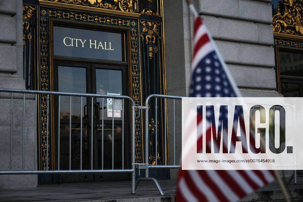San Francisco, California, U.S - A San Francisco Deputy s Sheriff looks outside City Hall as a crowd gathers during a protest against United States President Donald Trump in San Francisco, California. San Francisco U.S. - ZUMAj106 20170120_zap_j106_005