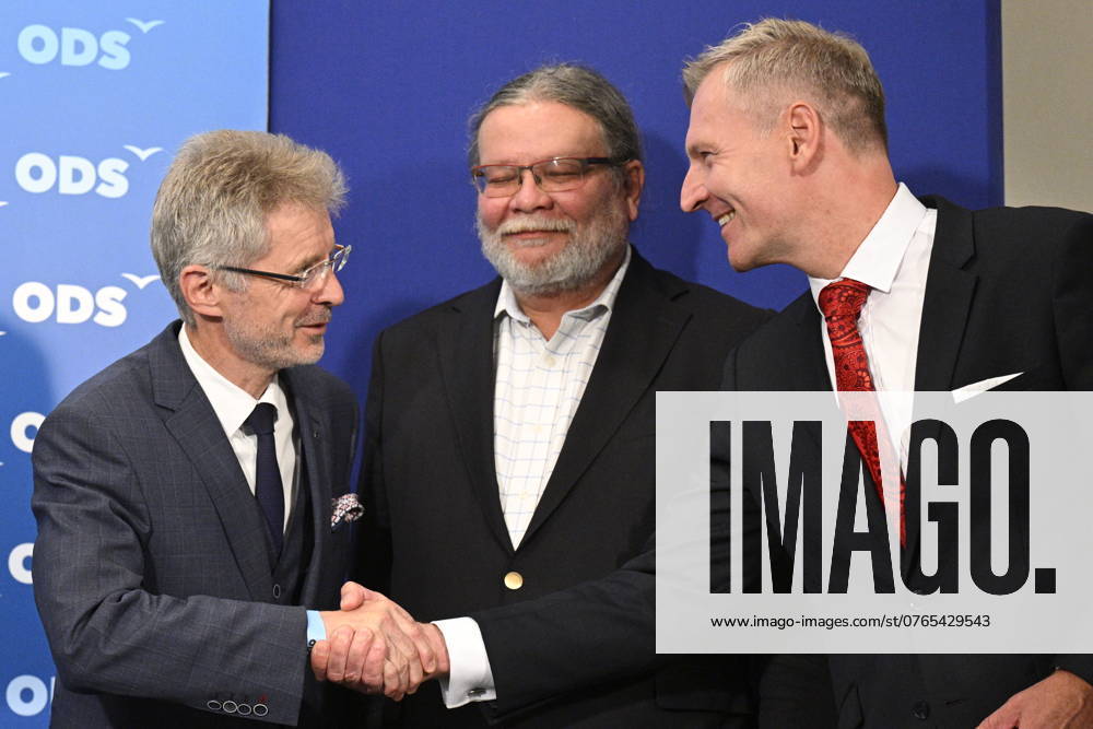 Czech Senate President Milos Vystrcil shake hands with newly elected Senator Zdenek Hraba at a press conference of Civic Democratic Party representatives on the results of the second round of the Senate elections at the ODS election headquarters, Prague, September 28, 2024. On the photo from left: Milos Vystrcil, MEP Alexandr Vondra and Zdenek Hraba. The second and final round of elections to one-third of the Senate, the upper house of parliament, continued in the Czech Republic today, on September 28, 2024, and voters will decide on 22 senators as five candidates were elected in the first round a week ago already. (CTKxPhoto MichalxKamaryt) CTKPhotoP2024092805168 CTKPhotoP2024092805168