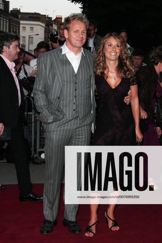 Sep 06, 2005; London, England, UK; Celebrity chef GORDON RAMSAY and wife arriving at the Royal Opera House in Covent Garden where the GQ Men of the Year Awards took place.. - ZUMAd33_ 20050906_mkh_d33_703