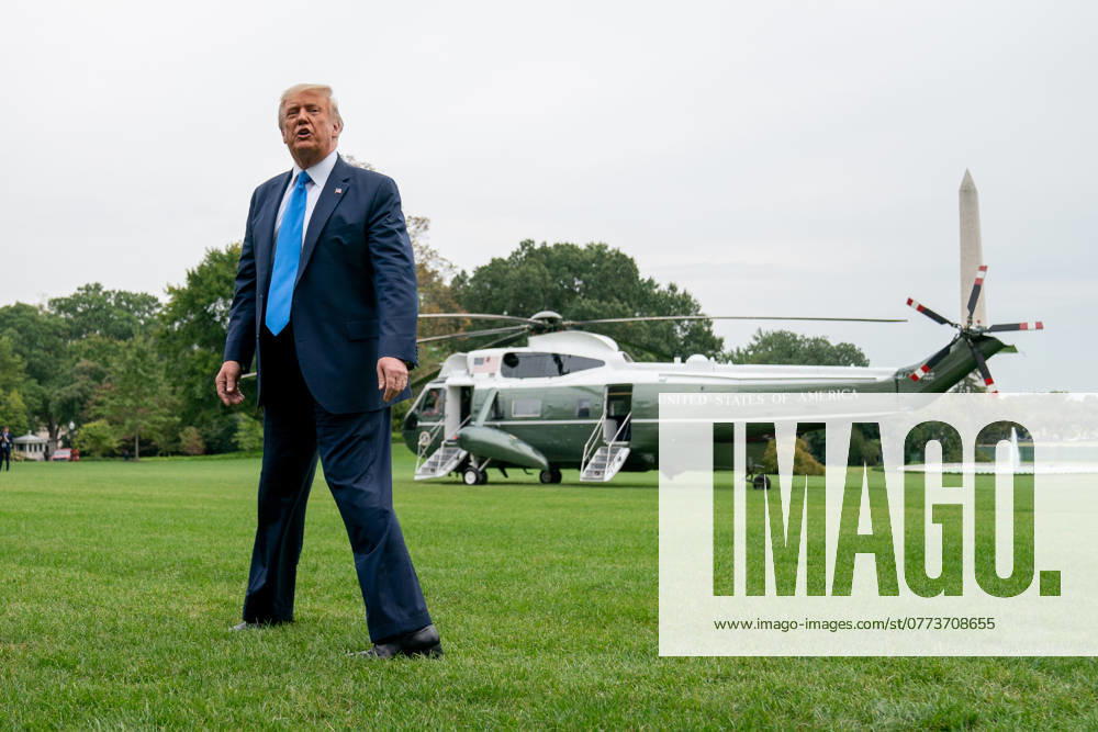 President Donald Trump Speaks to Members of the Media United States President Donald J. Trump speaks to visitors on the South Lawn of the White House before boarding Marine One in Washington, D.C., U.S., on Thursday, September 24, 2020. Credit: Erin Scott Pool via CNP AdMedia Washington District of Columbia United States of America