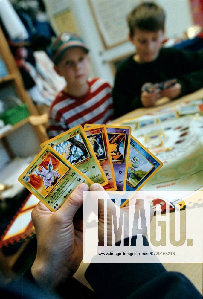 STOCKHOLM 000414 Students at Eriksdalsskolan play with their Pokemon cards