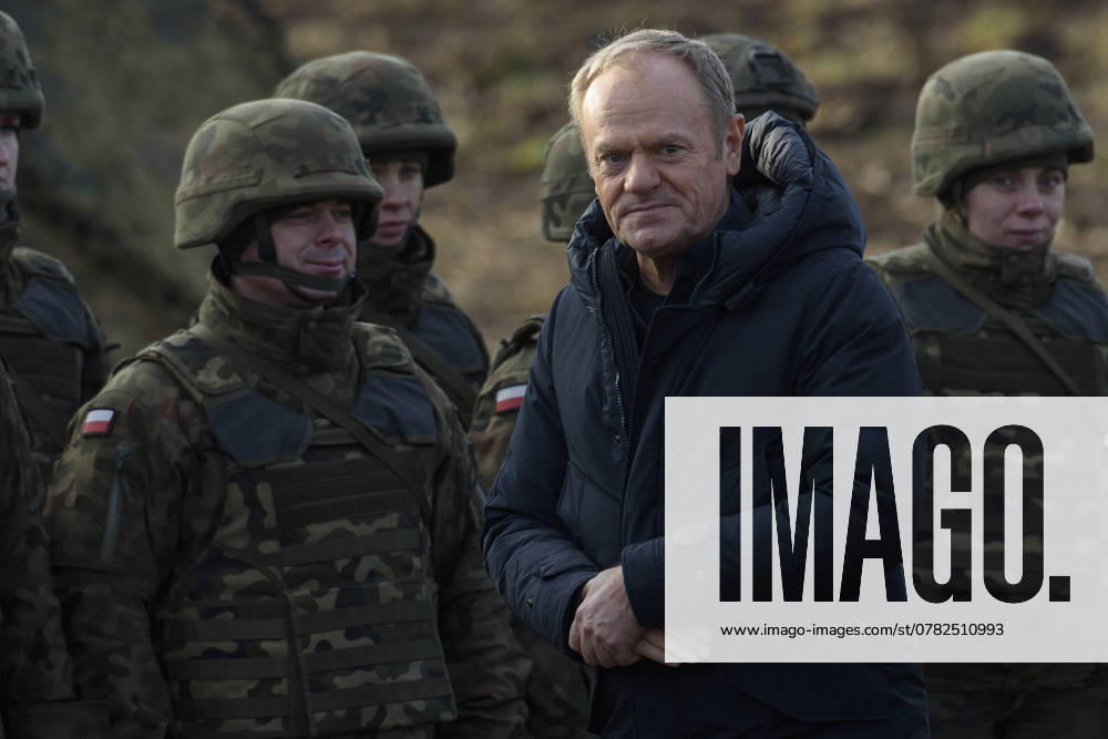 Polish PM Visits First Stage Of The East Shield Near Border With Russia. Polish Prime Minister Donald Tusk visits members of the Polish armed forces at the Polish-Russian border in Dabrowka, Poland, on November 30, 2024. The East Shield programme comprises a complex of barriers, fortifications, and state-of-the-art airspace monitoring systems designed to guard Poland s northern and eastern borders. According to the existing plans, the fortifications encompass Podlasie, Lublin, Warmia-Masuria, and parts of Masovia voivodeships. The cost of the entire programme is estimated at PLN 10 billion, with construction work expected to be completed by 2028. Dabrowka Poland