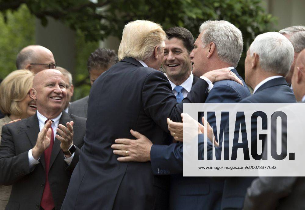 President Donald Trump embraces Speaker of the House Paul Ryan, R-Wis. (L) and House Majority Leader Kevin McCarthy, R-Calif., during a press event celebrating the House passage of Republican legislation to roll back the Affordable Care Act, at the White House in Washington, D.C. on May 4, 2017. The American Health Care Act passed the House with a vote of 217-213 vote. It will next move to the Senate. WAP20170504331 KEVINxDIETSCH