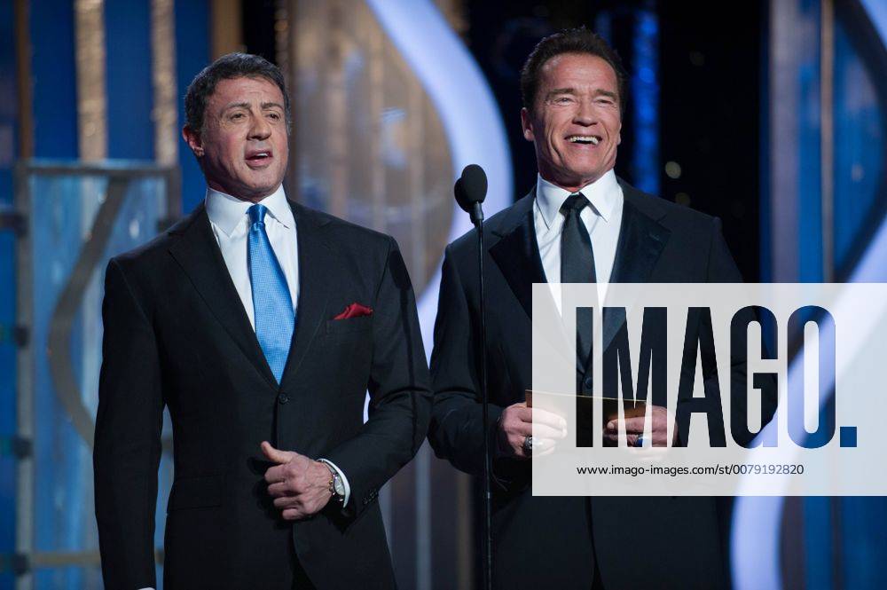 Sylvester Stallone and Arnold Schwartzenegger present the award for Best Foreign Language Film at the 70th Annual Golden Globe Awards at the Beverly Hilton in Beverly Hills, CA on Sunday, January 13, 2013. BEVERLY HILLS CA USA