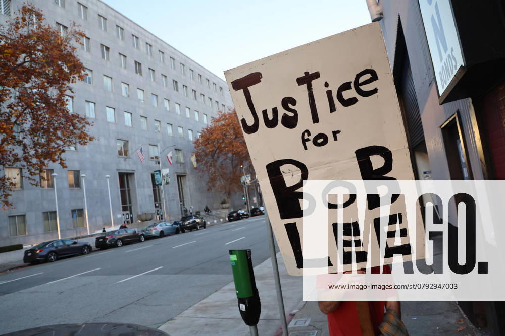 A supporter for a just trial for Murdered tech executive Bob Lee relative, seen holding a sign outside the courthouse during closing arguments of the trial of Nima Momeni is, who is charged with murdering Tech executive Bob Lee in San Francisco, California. Bob Lee, who created the mobile payment service Cash App, was murdered in the cityâ€⠢s downtown Rincon Hill neighborhood on April 4, 2023. San Francisco USA - ZUMAm117 20241203_zaf_m117_217