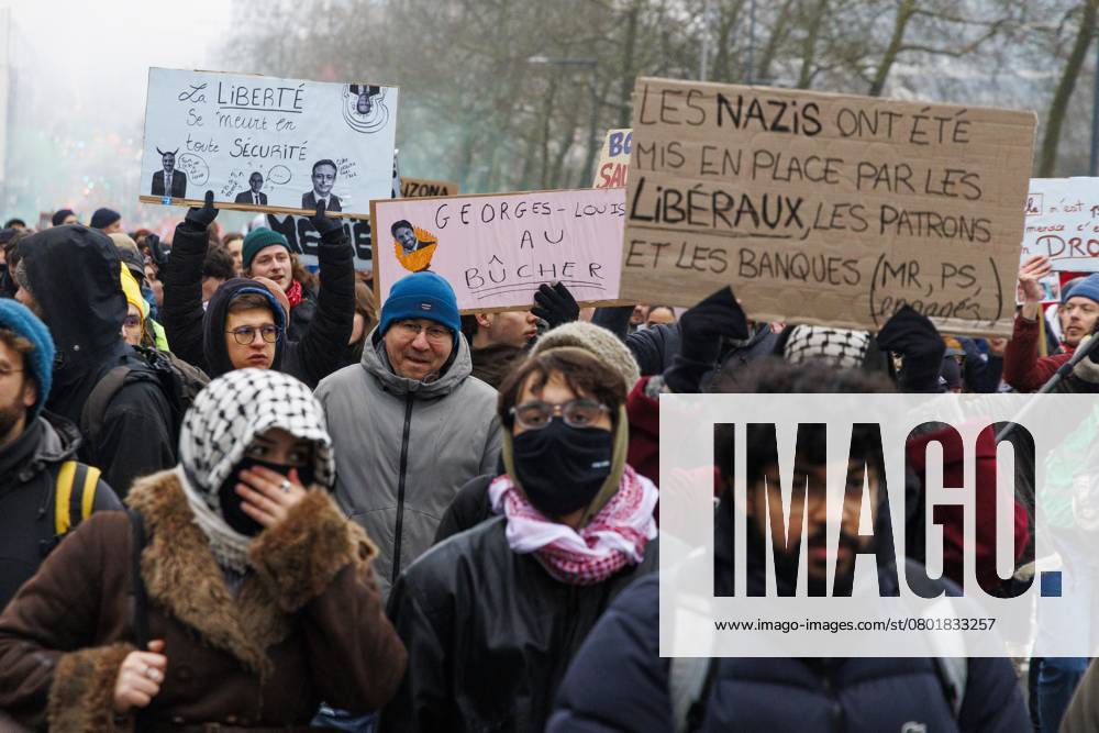 Protesters pictured during a national demonstration against the new government declaration, organized by the three national trade unions, Thursday 13 February 2025 in Brussels. NICOLASxMAETERLINCK 112369360