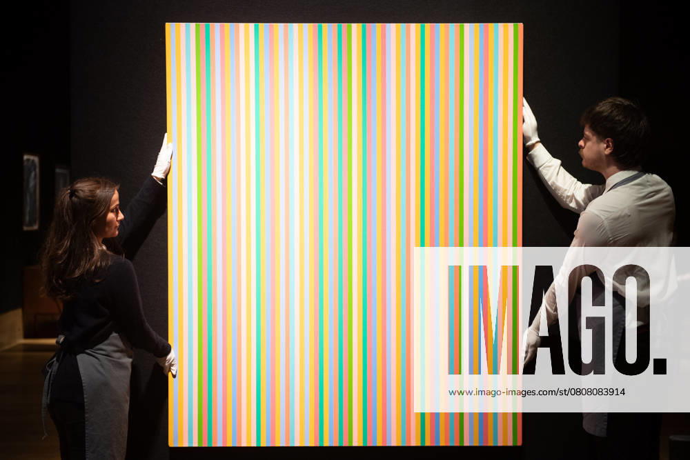 Bonhams 20th 21st Century Art Day Evening Sales Highlights Photocall - Bonhams, London Art handlers hold Myrrh by Bridget Riley (est £1.5m -£2.5m) which is to go on auction at Bonhams 20th 21st Century Art Day Evening Sales at Bonhams in London, England, UK on Monday 31 March, 2025., Credit:Justin Ng Avalon UK, England, London, Bonhams
