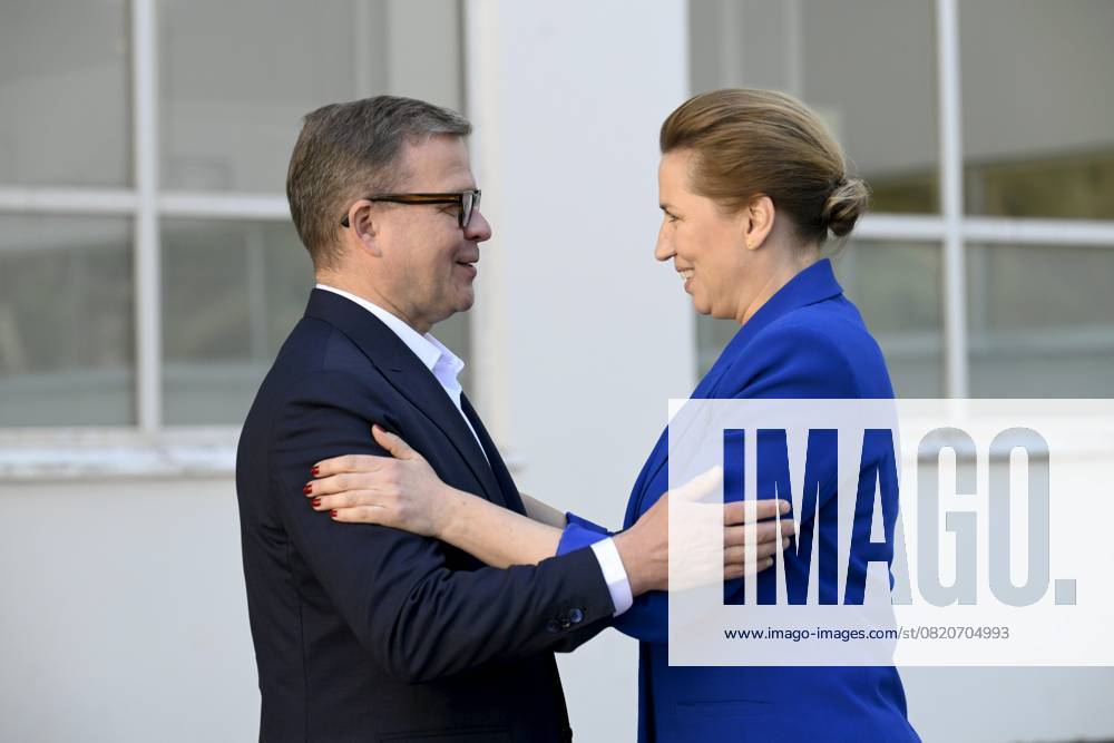 Finnish Prime Minister Petteri Orpo (L) welcomes Danish Prime Minister Mette Frederiksen at the Nordic Prime Ministers Summer Meeting at the Paimio Sanatorium in Paimio, Finland, on May 26, 2025. Finland and Åland together host the informal summer meeting. The discussions of the meeting will focus on two themes: competitiveness and strengthening comprehensive security. Paimio Finland