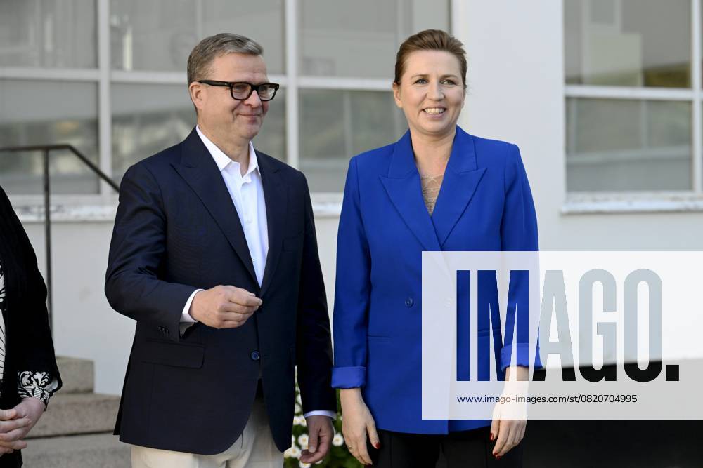 Finnish Prime Minister Petteri Orpo (L) welcomes Danish Prime Minister Mette Frederiksen at the Nordic Prime Ministers Summer Meeting at the Paimio Sanatorium in Paimio, Finland, on May 26, 2025. Finland and Åland together host the informal summer meeting. The discussions of the meeting will focus on two themes: competitiveness and strengthening comprehensive security. Paimio Finland